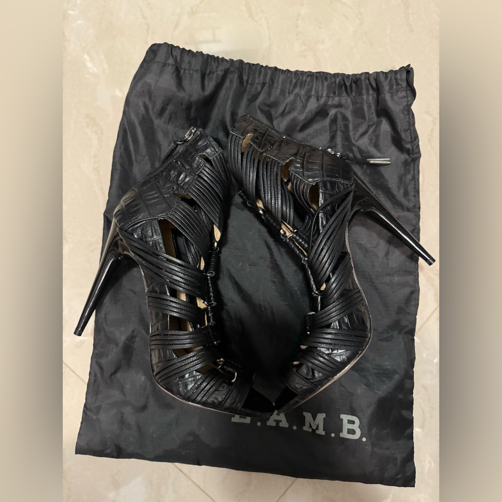 Size 6M, L.A.M.B, leather sole, brand new.